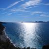 Spiaggia Lunga sullo sfondo dell'Elba.